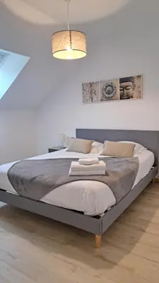 Un ou plusieurs lits dans un hébergement de l'établissement Maison tout confort proche Azay-le-Rideau 8 p