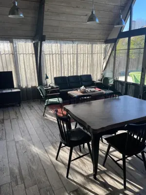 Coin salon dans l'établissement L’Aubépine