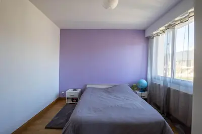 Un ou plusieurs lits dans un hébergement de l'établissement Le Cottage - circuit Bugatti - wifi - 8pers - Rêve au Mans