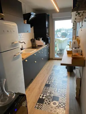 Cuisine ou kitchenette dans l'établissement Appartement pour les 24 heures