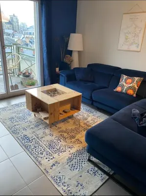 Coin salon dans l'établissement Appartement pour les 24 heures