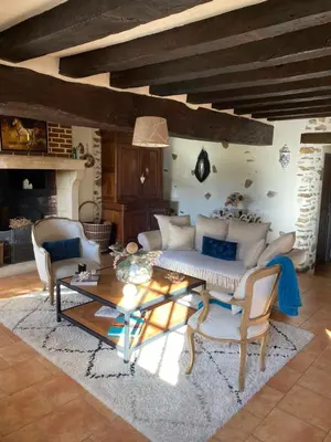 Coin salon dans l'établissement Maison de Campagne Le Pâtis aux Chevaux proche circuit 24H et Le Mans