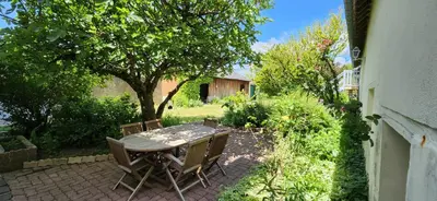 Jardin de l'établissement Le Petit Lavoir - Maison Cosy à Mayet