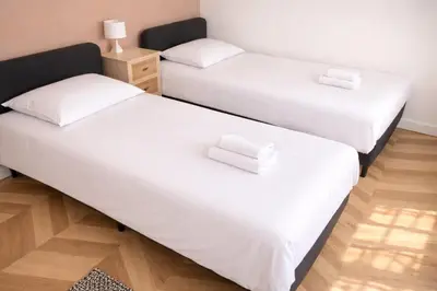 Un ou plusieurs lits dans un hébergement de l'établissement La maison au bord de la riviére