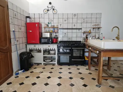 Cuisine ou kitchenette dans l'établissement Le Pressoir