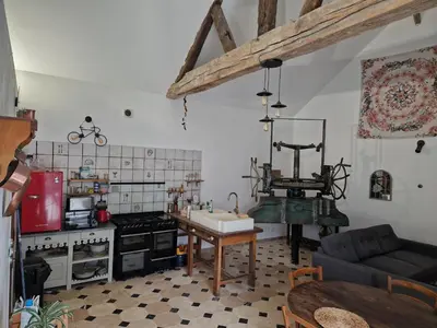 Cuisine ou kitchenette dans l'établissement Le Pressoir