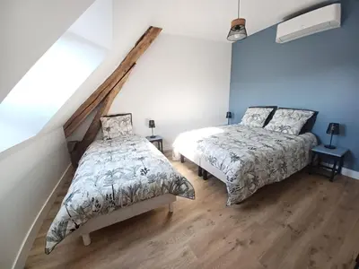 Un ou plusieurs lits dans un hébergement de l'établissement Rêve de Loire gîte au calme au pied des châteaux de la Loire