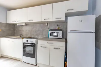 Cuisine ou kitchenette dans l'établissement La Tannerie