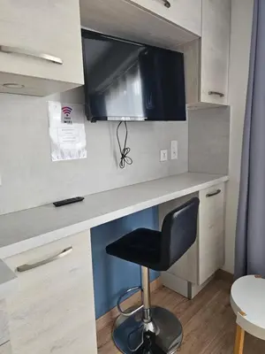 Télévision ou salle de divertissement dans l'établissement Studio Grammont 3