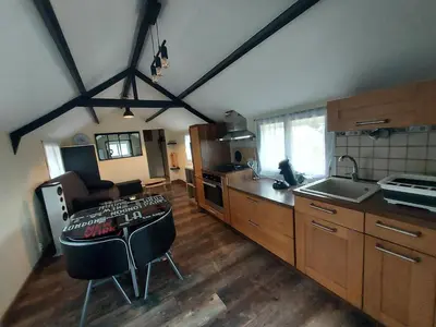 Cuisine ou kitchenette dans l'établissement le chalet de vaucroix
