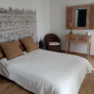 Un ou plusieurs lits dans un hébergement de l'établissement Chambre chez l'habitant Aux portes du Mans Evénements circuits du Mans