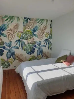 Un ou plusieurs lits dans un hébergement de l'établissement Gîte 4 etoiles à la campagne