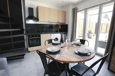 Cuisine ou kitchenette dans l'établissement Maison la Cassine - Centre Doué la Fontaine - Proche Zoo