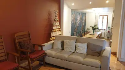 Coin salon dans l'établissement Gîte une histoire de village