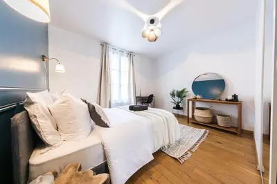 Un ou plusieurs lits dans un hébergement de l'établissement Appartement lumineux 2 chambres Coeur de Tours