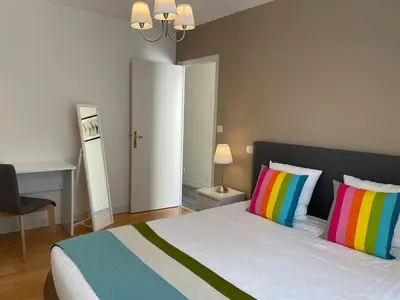 Un ou plusieurs lits dans un hébergement de l'établissement Appartement Coeur de Ville