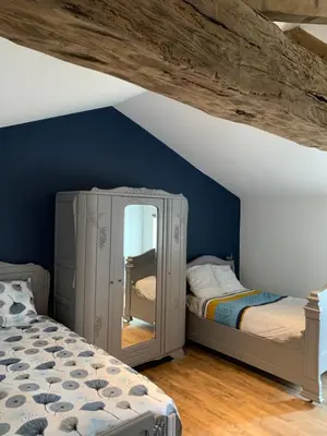 Un ou plusieurs lits dans un hébergement de l'établissement Appartement Cosy La Maison de Jean