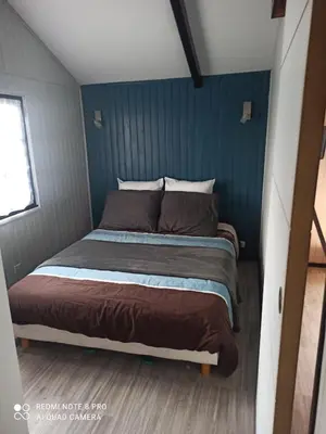 Un ou plusieurs lits dans un hébergement de l'établissement Chalet de l'amitié