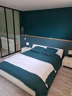 Un ou plusieurs lits dans un hébergement de l'établissement Chambre proche circuit 24h