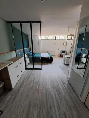 Un ou plusieurs lits dans un hébergement de l'établissement Chambre proche circuit 24h