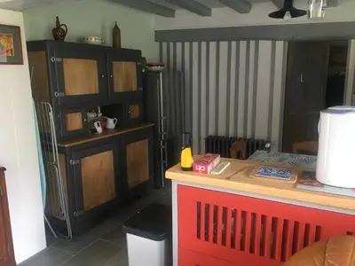 Cuisine ou kitchenette dans l'établissement La Vannerie
