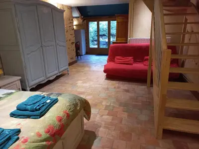 Coin salon dans l'établissement Chambre d'hôtes à proximité du circuit des 24h