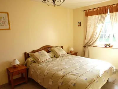 Un ou plusieurs lits dans un hébergement de l'établissement La maison de marguerite