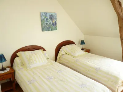 Un ou plusieurs lits dans un hébergement de l'établissement La maison de marguerite