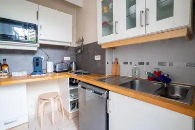 Cuisine ou kitchenette dans l'établissement Sophie 2 pers à 20 minutes de Beauval