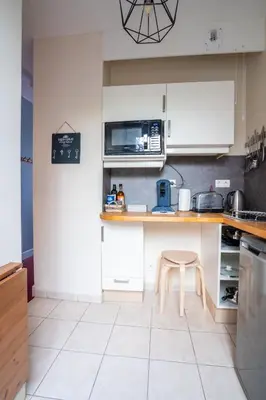 Cuisine ou kitchenette dans l'établissement Sophie 2 pers à 20 minutes de Beauval