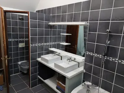 Salle de bains dans l'établissement La Ferme Neuve
