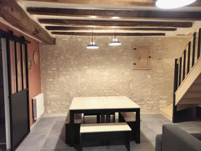 Coin salon dans l'établissement Maison charmante