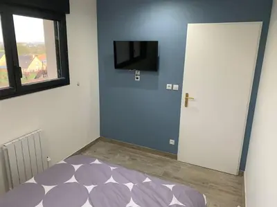 Télévision ou salle de divertissement dans l'établissement Villa piscine/spa privé intérieur 33° ZOO DE LA FLECHE 24h DU MANS