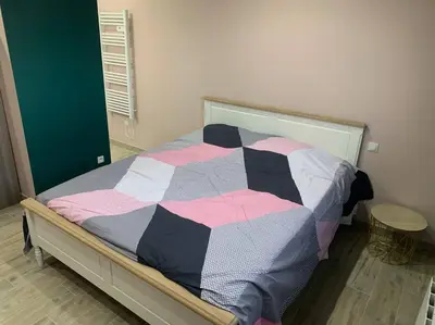 Un ou plusieurs lits dans un hébergement de l'établissement Villa piscine/spa privé intérieur 33° ZOO DE LA FLECHE 24h DU MANS