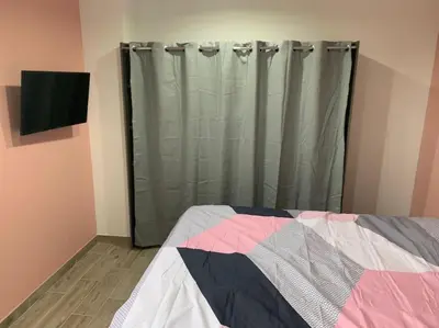 Un ou plusieurs lits dans un hébergement de l'établissement Villa piscine/spa privé intérieur 33° ZOO DE LA FLECHE 24h DU MANS