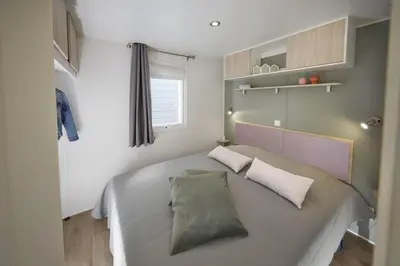 Un ou plusieurs lits dans un hébergement de l'établissement Camping Valloire-sur-Cisse
