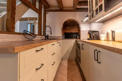 Cuisine ou kitchenette dans l'établissement Le Relai de Boissée