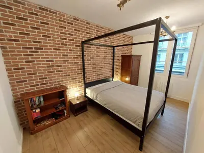 Un ou plusieurs lits dans un hébergement de l'établissement La Chambre des Sorciers