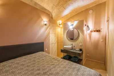 Un ou plusieurs lits dans un hébergement de l'établissement Gîte troglodyte - Troglo du Pontcher