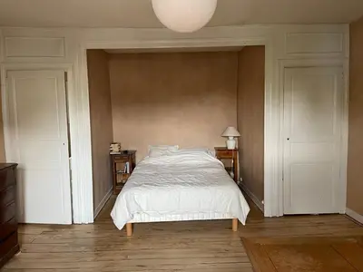 Un ou plusieurs lits dans un hébergement de l'établissement Chambres à louer centre-ville