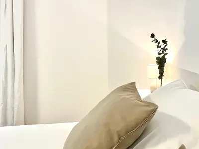 Un ou plusieurs lits dans un hébergement de l'établissement La Petite Maison du 9