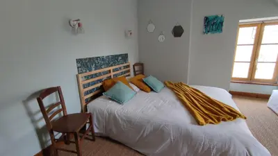 Un ou plusieurs lits dans un hébergement de l'établissement Le Relais des Fontaines