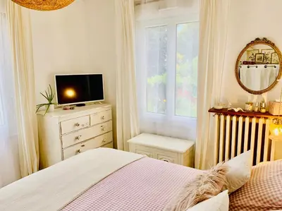 Un ou plusieurs lits dans un hébergement de l'établissement La maison Cattleya