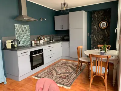 Cuisine ou kitchenette dans l'établissement La maison Cattleya