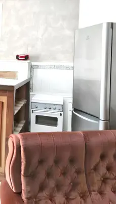 Coin salon dans l'établissement Chaleureuse Maison de Campagne avec Terrasse et Cheminée