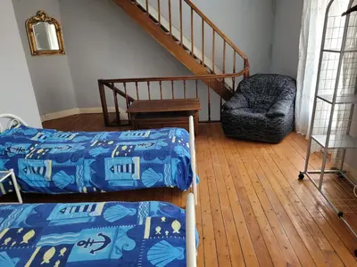 Un ou plusieurs lits dans un hébergement de l'établissement Gite chez Odile maison entiere 6 personnes