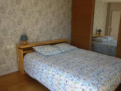 Un ou plusieurs lits dans un hébergement de l'établissement Chambre le Mans