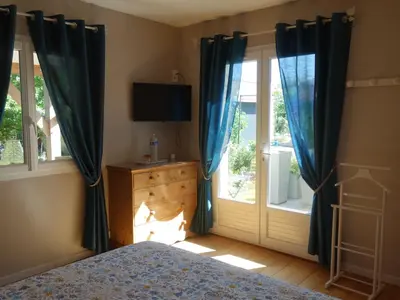 Un ou plusieurs lits dans un hébergement de l'établissement Chambre le Mans