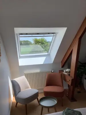 Coin salon dans l'établissement Maison à la campagne