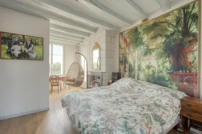 Un ou plusieurs lits dans un hébergement de l'établissement Jacuzzi et Vue sur Loire - Maison d'hôtes L'Odyssée